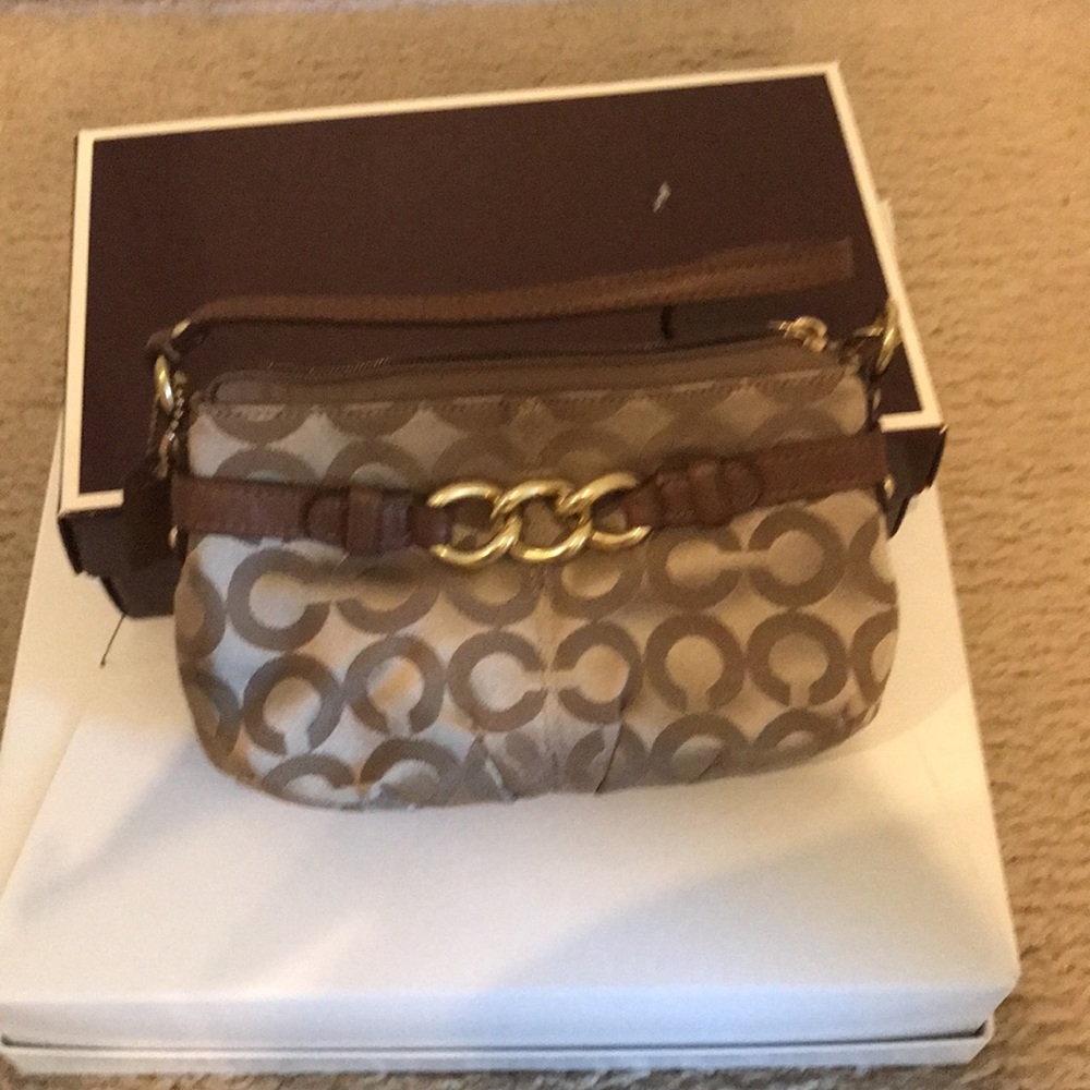 Coach clutch NWOT.